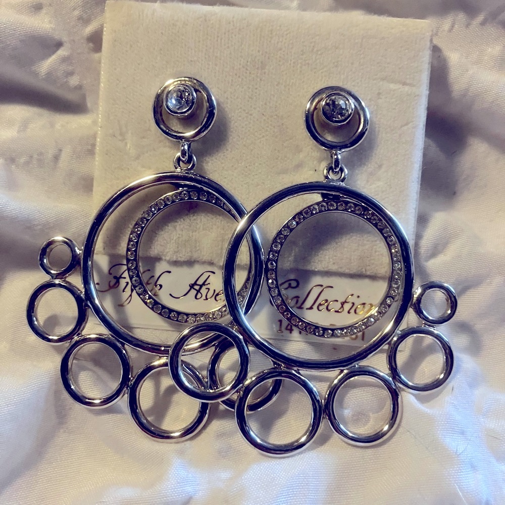Silver earrings with genuine Swarovski crystals and 14kt gold posts.